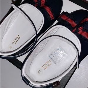 Infant Gucci shoes.